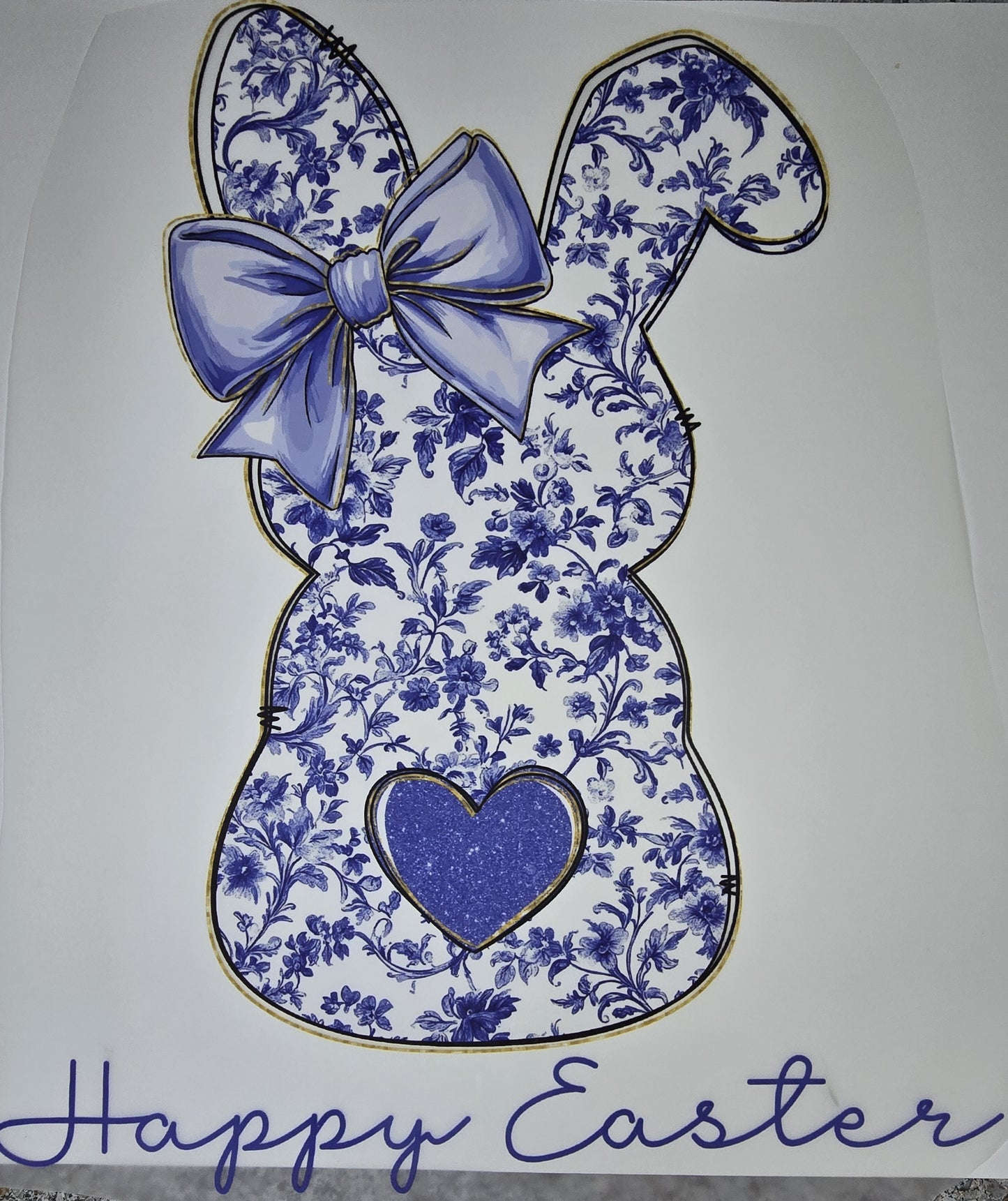 DTF Easter graphic - Large "Happy Easter" Blue Bunny Silhouette with pink floral pattern with bow heart tail